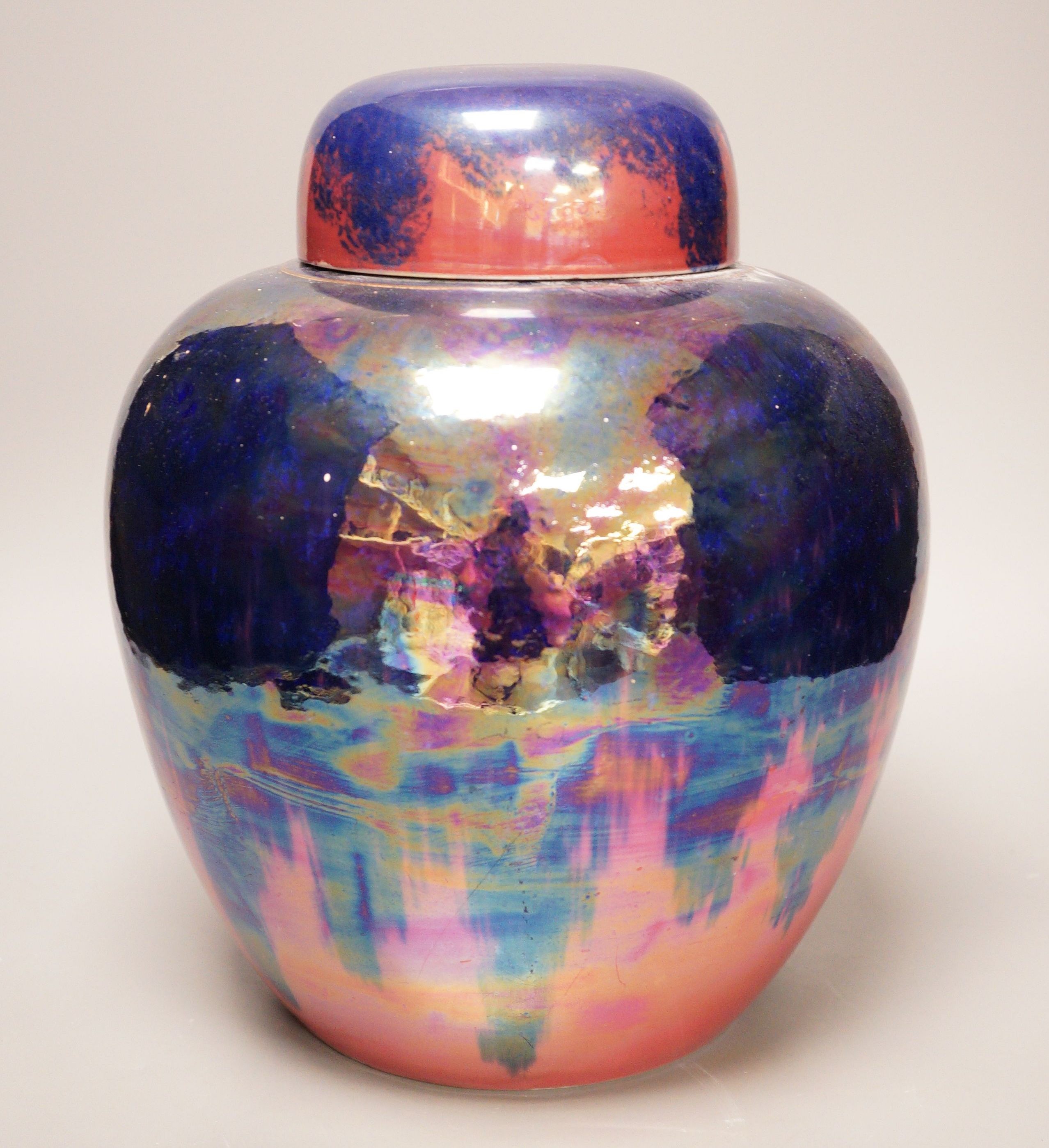 A large Carlton Ware pink and purple lustre ginger jar and cover, 32cm tall